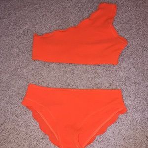 orange one strap swimsuit